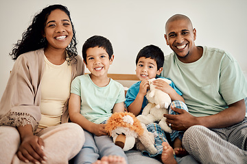 Image showing Happy family portrait of mother, father and children with teddy bear, toys and home bonding, playing and enjoying time together. Happiness, morning love and smiling mom, dad and kids relax in bedroom