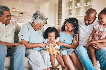 Image showing Family, tickle and child with happy people in relax home with love and bonding together on sofa. Happiness, grandparents and parents with kids, generations and relationship with laughter or fun game