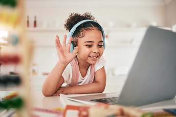 Image showing Laptop, video call communication and happy child elearning, wave hello or talking in remote youth development lesson. Home school education, learning in study and young kid listening on online class