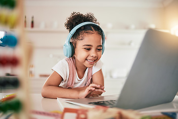 Image showing Laptop, home education and happy child elearning, kindergarten homework or remote school work. Knowledge website, learning software and young kid streaming youth development lesson on headphones