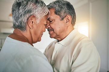 Image showing Forehead touch, love and senior couple in care, romantic spouse support or relax in retirement time together. Romance connection, marriage partner and elderly woman, old man or people bonding at home