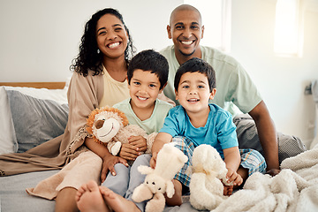 Image showing Happy family, bed and portrait of parents and children bonding in a bedroom in a house and playing together. Care, mother and father excited with kids in the morning as love, happiness and care