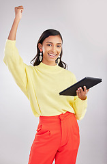 Image showing Winner, excited and portrait of woman on tablet for online bonus, winning and wow celebration on white background. Studio, success and girl cheer on digital tech for social media, internet and app