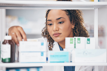 Image showing Reading, woman or pharmacist with medicine pills or supplements products to check drugs inventory. Wellness, healthcare or doctor with boxes of medical product or stock on shelf in retail pharmacy
