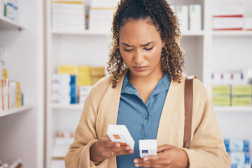 Image showing Pharmacy, customer or woman with doubt about medicine or healthcare products or medication in drugstore. Confused, choice or person searching or reading box of pills or shopping in medical chemist