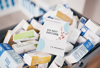 Image showing Sign, healthcare and medicine in an empty pharmacy for the treatment or cure of disease and insurance. Do not disturb, medical and medicine box, package or container in a pharmaceuticals clinic