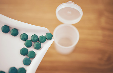 Image showing Medicine, container or organize pills for pharmacy correct dose, inventory or pharmaceutical management. Closeup of healthcare tablets, medical products background or retail store stock distribution