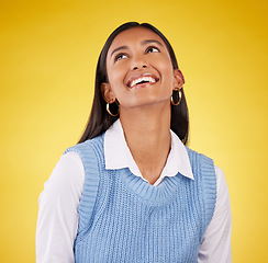 Image showing Funny, happy and woman with idea, thinking and decision with joy against studio background. Female, smile or confident girl with motivation, inspiration and mindset with goals, target and daydreaming