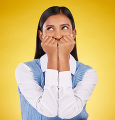 Image showing Silly, woman and happy in a studio with a female model feeling playful and cute. Isolated, yellow background and young person with funny, comic and goofy happiness with emoji and fun joke alone