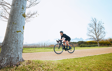 Image showing Cycling, fitness and sports with woman in park for training, workout and health mockup. Exercise, travel and freedom with female cyclist riding on bike in nature for adventure, journey and transport