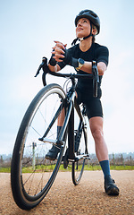 Image showing Thinking, cycling and fitness with woman in nature for training, workout or sports cardio. Health, relax and strong with female cyclist riding on bike in outdoor for exercise, endurance and challenge