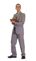 Image showing Businessman Doing Inventory