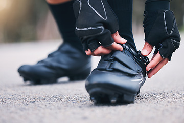 Image showing Fitness, shoes and closeup with woman in road for running, workout and sports challenge. Cardio, exercise and race with female runner fix sneakers in outdoors for training, strong and performance