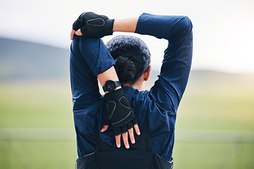 Image showing Fitness, workout and woman stretching her arms for outdoor training for a race, marathon or competition. Sports, health and back of a female athlete runner doing a warm up exercise before running.