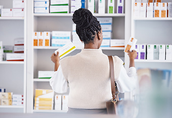 Image showing Woman, drugs and shelf for healthcare illness, pain or relief at pharmacy looking at pills or medication. Sick female customer or patient taking pharmaceutical products for self diagnosis at a clinic