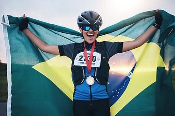 Image showing Winner sports, happy woman from brazil with flag and gold medal winning athlete, outdoor cycling race or triathlon. Happiness, win and cyclist with smile, fitness and world record with national pride