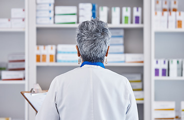 Image showing Back, pharmacy and checklist with woman in store for inventory, medicine and shelf stock. Retail, shopping and healthcare with pharmacist and clipboard for medical, prescription and product