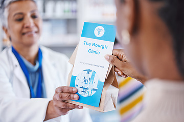 Image showing Consulting pharmacist, prescription drugs in package and advice on health care, medicine and insurance. Healthcare, pharmacy and woman consultant at clinic with medical information with pills in bag.