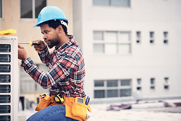 Image showing Black man, electrician and maintenance with engineering and ac repair with handyman working with tools on roof. Fix air conditioner, male technician with screwdriver and power generator with service