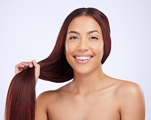 Image showing Portrait of happy woman with hair in hands, beauty and care for straight haircut and luxury salon shine on white background. Haircare, glow and happiness, face of Brazilian model on studio backdrop.