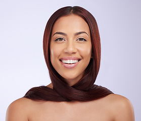 Image showing Hair care, happy woman and portrait in a studio with beauty and haircut growth from salon styling. Isolated, gray background and female model with healthy cosmetics and shampoo treatment results