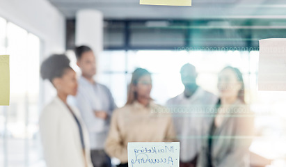 Image showing Creative business people, planning and meeting with sticky note for brainstorming, ideas or strategy at office. Group of employee workers thinking in project plan or tasks on glass board for startup