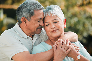 Image showing Senior couple, relax and hug in park, garden and nature for love, care and peace of calm relationship. Man, woman and retirement of partner, support and marriage for romance, quality time and outdoor