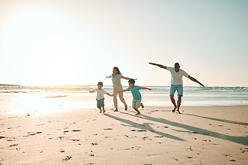 Image showing Beach, run and airplane by family playing, freedom and happy along the ocean on blue sky background. flying, game and children running with parents in Mexico for travel, trip and summer vacation