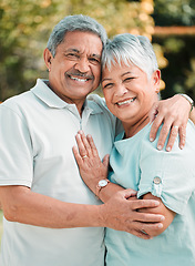 Image showing Retirement couple, portrait and hug in park, garden and nature for love, care and happiness in sunshine. Happy man, woman and senior marriage partner relaxing outdoor with smile, quality time and joy