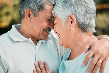 Image showing Happy senior couple, face touch and love in park, garden and outdoor with hug, care and happiness together. Elderly man, woman and retirement of marriage partner, relax and support of quality time