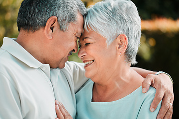 Image showing Senior couple, forehead touch and love outdoor in park, garden and nature for hug, care and happiness together. Happy man, woman and retirement with partner, relax and support in marriage for romance