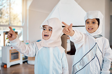 Image showing Astronaut, home and children pointing, playing and role play space travel, fantasy games or explore new discovery. Rocket spaceship, creative halloween costume and kids imagine a galaxy adventure