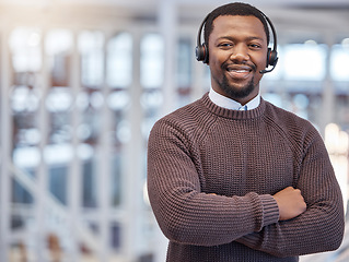 Image showing Call center, smile and portrait of black man with arms crossed in office with pride for career, job or customer service. Face, telemarketing and happy, proud and confident sales agent from Nigeria.