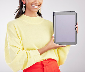 Image showing Tablet, studio and hands of woman with smile for advertising, promotion and mockup screen. White background, happy and closeup of girl with digital tech for social media, website and mobile app brand