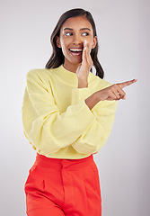 Image showing Pointing whisper, gossip and a woman bully isolated on a white background in a studio. News, talking and a young corporate worker whispering a secret, information or gossiping about an employee