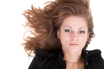 Image showing Portrait of the young beautiful woman. Isolated on a white backg