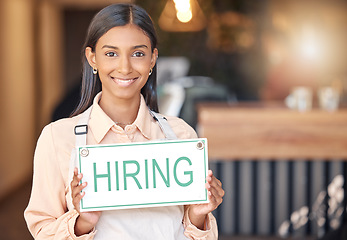 Image showing Woman, hiring sign or portrait smile in small business for recruitment, hire or job opportunity at cafe. Happy, confident or female employer or owner with coffee shop recruiting or advertising poster