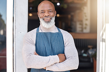 Image showing Black man, portrait smile and arms crossed in small business cafe or retail store by entrance door. Happy African American senior businessman standing in confidence at restaurant or coffee shop