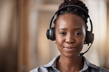 Image showing Customer support, black woman and portrait in call center, contact us and CRM with headset, face and mockup space. Closeup, consultant and female employee in telemarketing, sales and help desk office