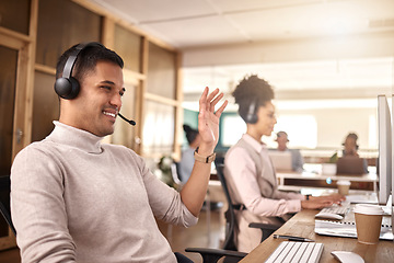 Image showing Businessman, call center and meeting on computer in customer service, support or telemarketing at the office. Happy man, consultant or agent talking with smile, headphones or waving for online advice