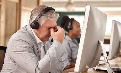 Image showing Call center, man and stress burnout at computer in office and tired of sales or customer service. Mature male, agent and consultant in telemarketing headache, support and crm mental health problem