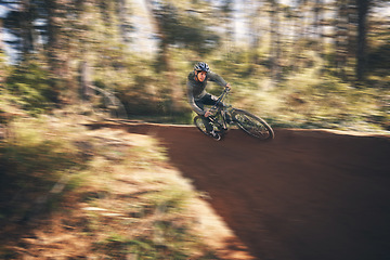 Image showing Fitness, fast bicycle and man outdoor on a forest path with extreme and exercise adventure. Bike, cycling and sport of an athlete with speed and nature cycle for sports training and race action