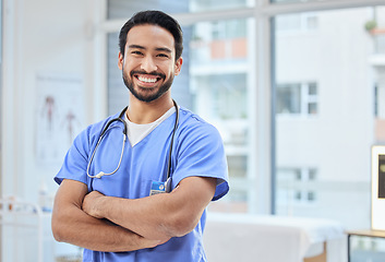 Image showing Healthcare, happy doctor and portrait of man in clinic for insurance, wellness and medical service. Cardiologist, hospital and health worker smile with crossed arms for care, consulting and help