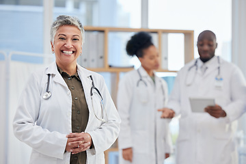 Image showing Hospital, doctor and portrait of senior woman in healthcare clinic for insurance, wellness and medical service. Medicine, leadership and female health worker smile for professional care and help