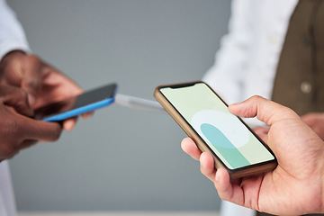 Image showing Business people, hands and phone screen for networking, communication or sharing information at the office. Mockup of group or community holding mobile smartphone for app, social media or data sync