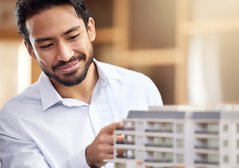 Image showing Architect, man and check building model, construction with smile on face and architecture project. Businessman in office, design and engineer with property development company and construction job