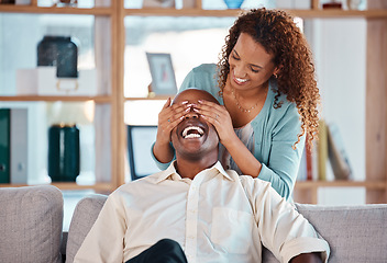 Image showing Surprise, woman and cover eyes of man in living room for happiness, love and care together. Happy couple, playful relationship and hide for excitement, smile and laughing in romantic marriage at home