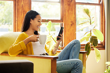 Image showing Woman, smartphone and coffee, smile at social media and communication, technology and scroll internet. Online chat, happy female relax at home with hot drink, mobile app or games with connectivity