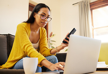 Image showing Laptop, remote worker and woman with phone in home living room for typing. Freelancer, computer or person with cellphone for working, email or research for online browsing, web scrolling or multitask