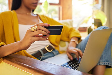 Image showing Woman, laptop and credit card with ecommerce, closeup of hands with online shopping and bank app. Female relax at home, fintech and internet banking with payment, retail store website and finance